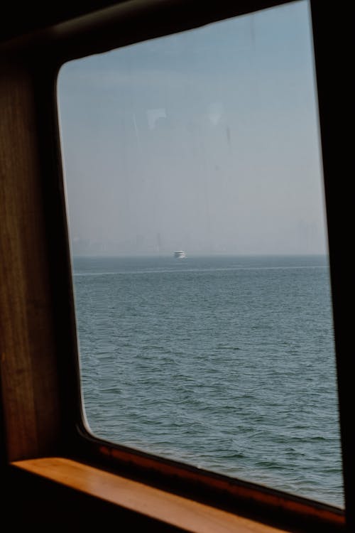 Free Sea behind Window Stock Photo