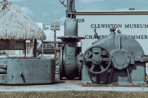Free Industrial machinery displayed outdoors at Clewiston Museum, Florida, showcasing historic engineering. Stock Photo