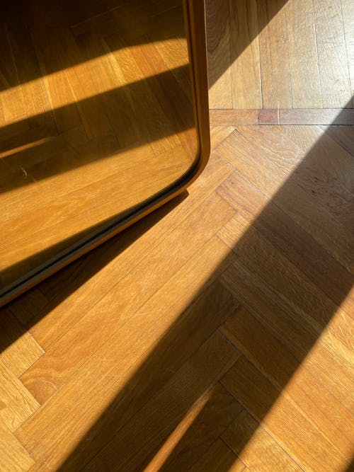 Sunlight and Shadow on Herringbone Flooring