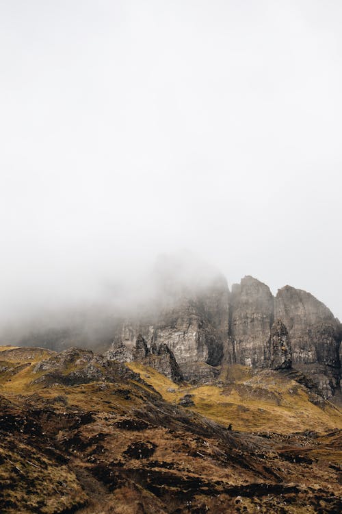 Mountains Shrouded in Thick Fog