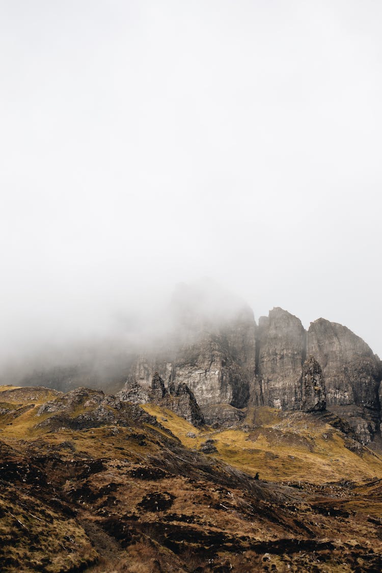 Mountains Shrouded In Thick Fog