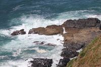 Waves breaking against a rocky headland — photo by Harvey Hickson on Pexels