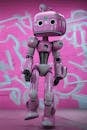 Cute Android Walking in front of a Graffiti Wall