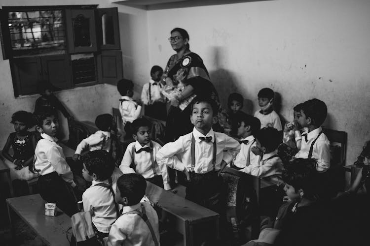 Children In Shirts In Classroom