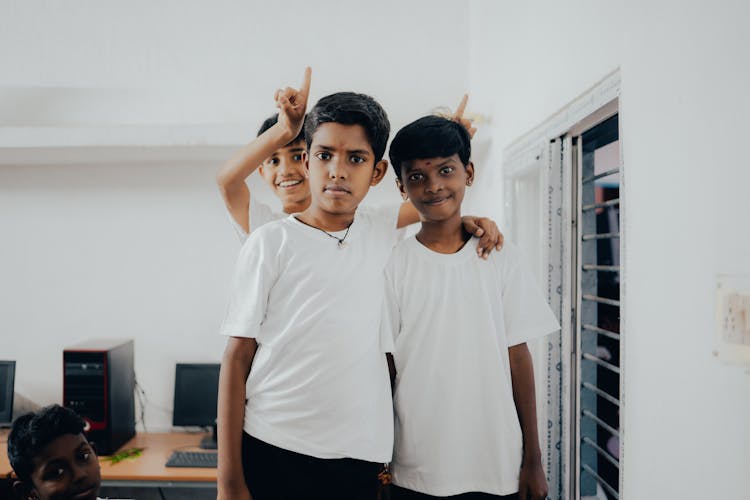 Boys In Classroom Making Fun