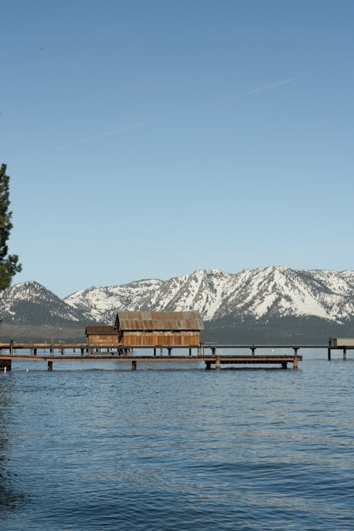 Wooden House on a Pier on a Lake