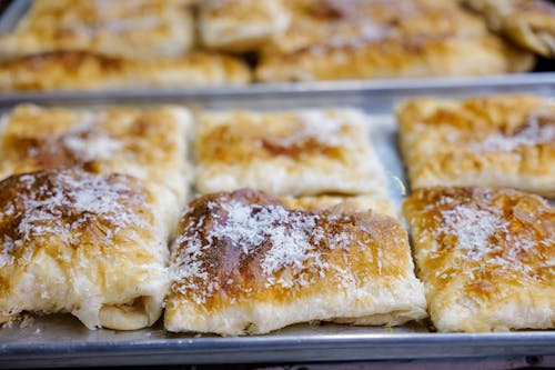 Tray of Pastires with Coconut Shreds on Top