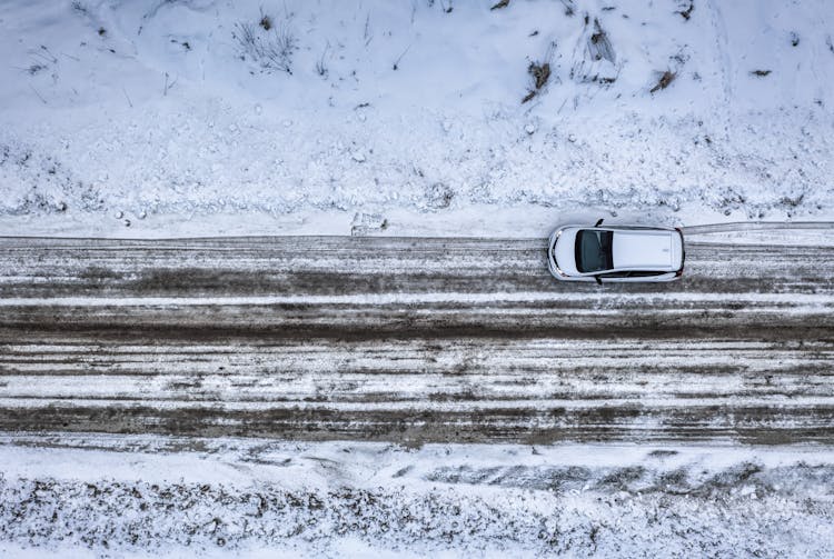 Car On Road In Snow