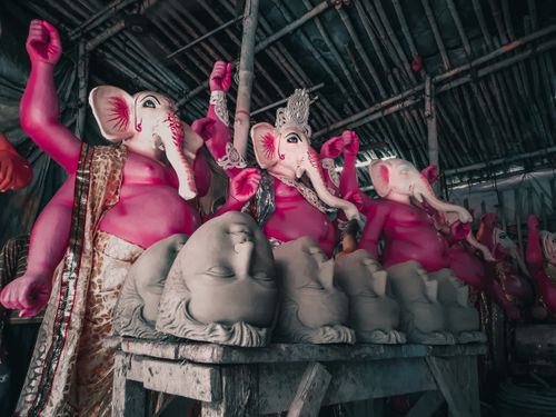 Free Vibrant Ganesha idols in preparation for a religious festival in Kolkata, India. Stock Photo