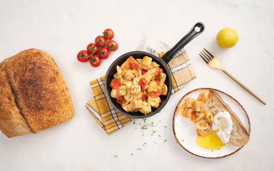 blistered cherry tomatoes in skillet