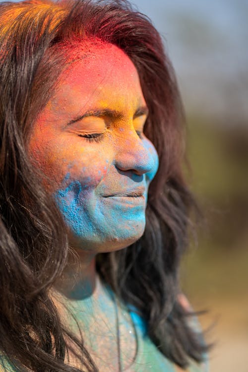 Smiling Woman with Painted Face