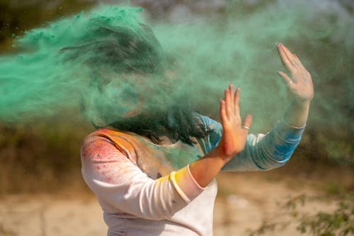 Woman Getting Color Powder Thrown on her 