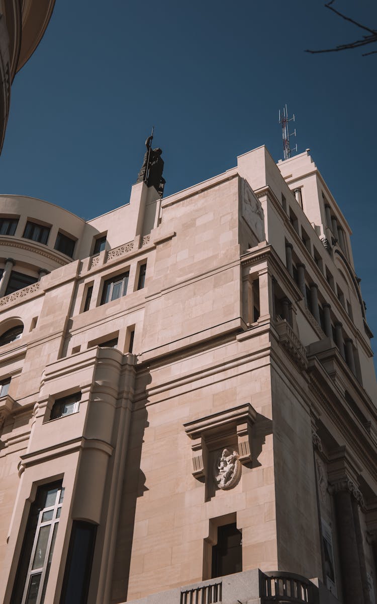 Historic Building Facade Against Blue Sky