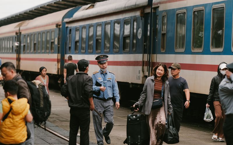 Passengers on a train station platform