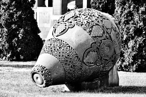 Old Stone Monument on Grass 