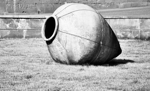 Free Large traditional clay wine vessel outdoors in a black and white setting. Stock Photo
