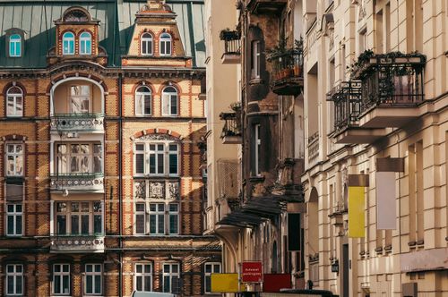 Free Beautiful historic buildings in Poznań, showcasing unique architectural facades and urban charm. Stock Photo