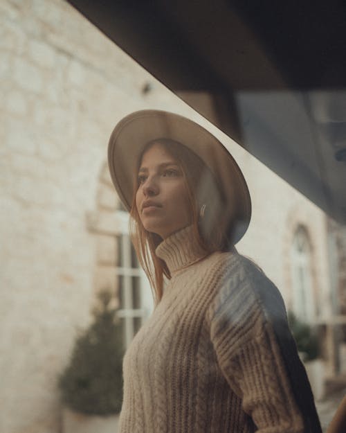 Woman in a Turtleneck and Hat 