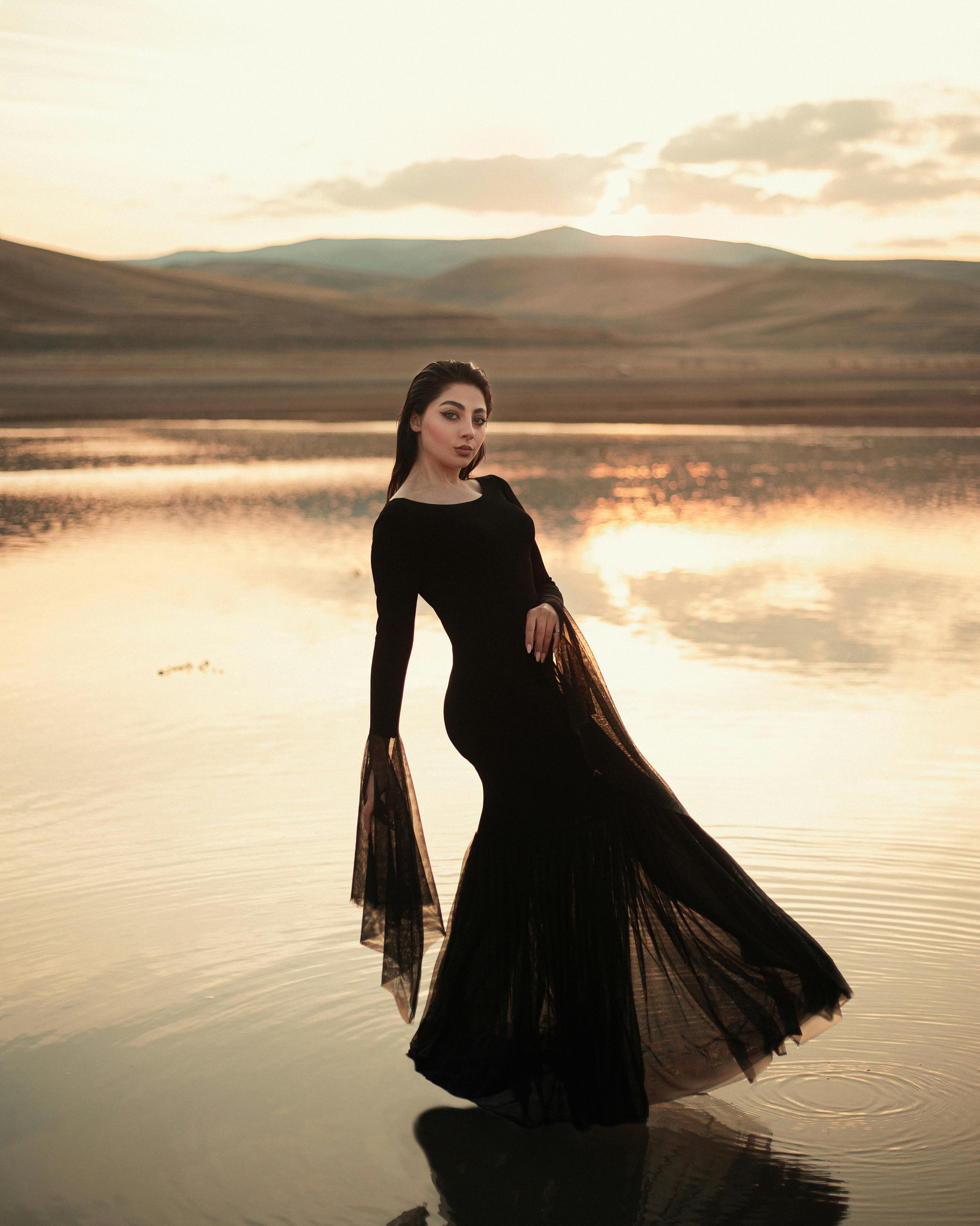 Woman in See-through Dress Lying on Wooden Floor · Free Stock Photo