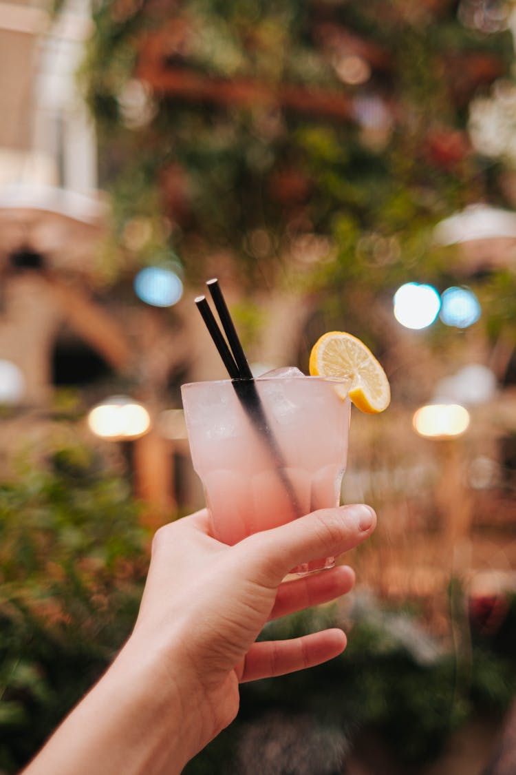 Hand Holding A Cold Drink