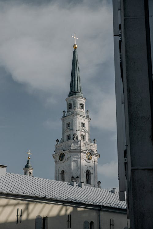 Free Church Steeple With a Cross on Top Stock Photo