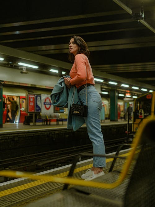 Woman Waiting on Subway Station