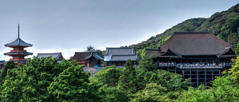 Red and Black Temple Surrounded by Trees Photo · Free Stock Photo