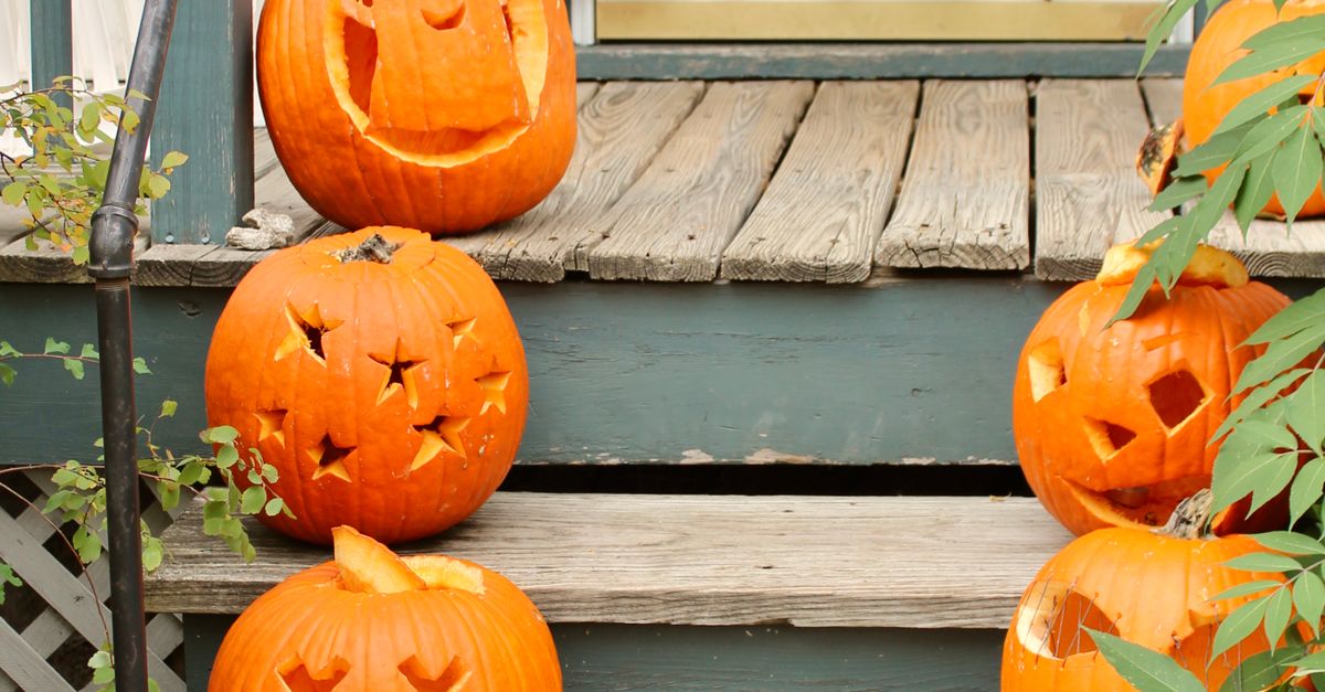 Carved Pumpkins on the Porch Steps · Free Stock Photo