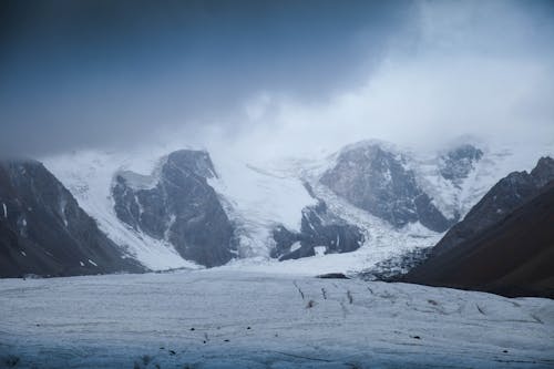 Foto profissional grátis de cadeia de montanhas, com frio, congelado