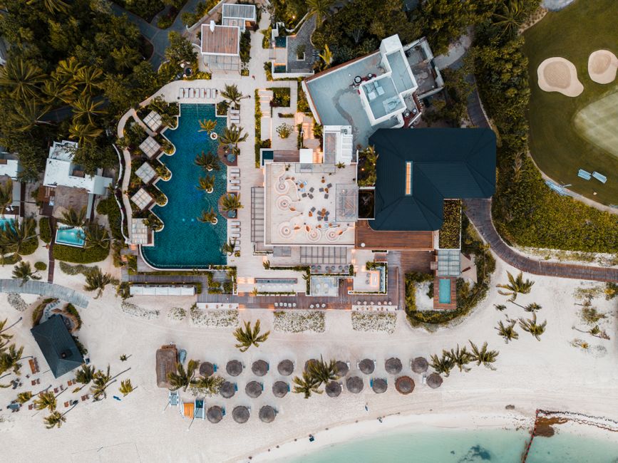 Aerial shot of a luxury beachfront resort in Playa del Carmen with turquoise Caribbean views