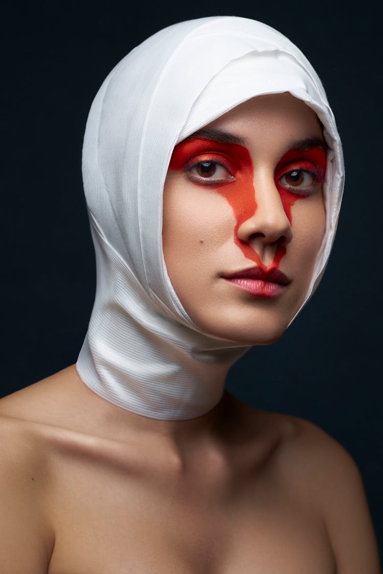 Woman In Hijab And With Painted Face