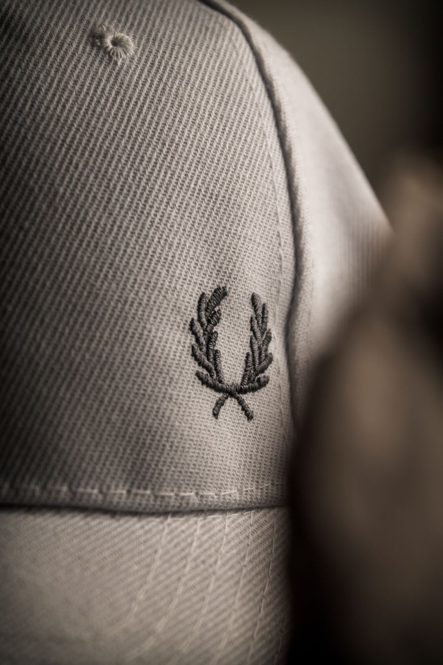 Embroidery machine stitching a logo