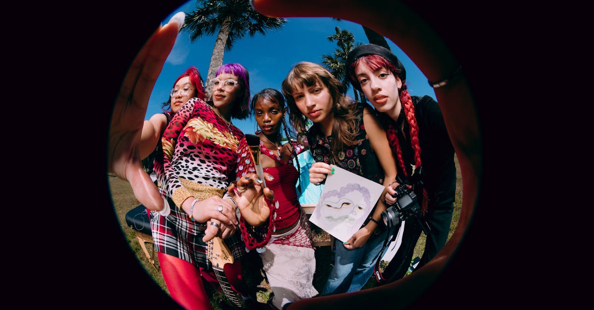 U.S. Citizenship application form being filled out with a pen on a desk.