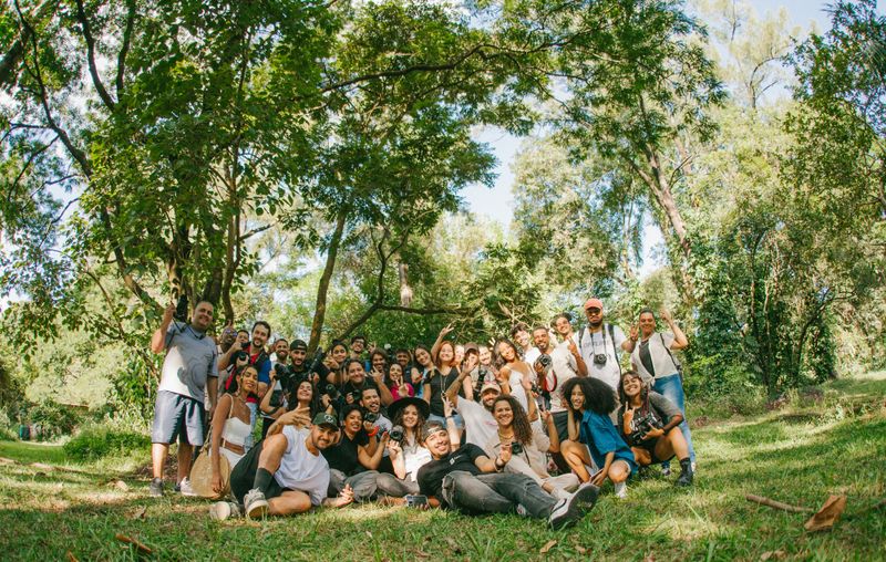 Large diverse group of friends enjoying a sunny day in a park