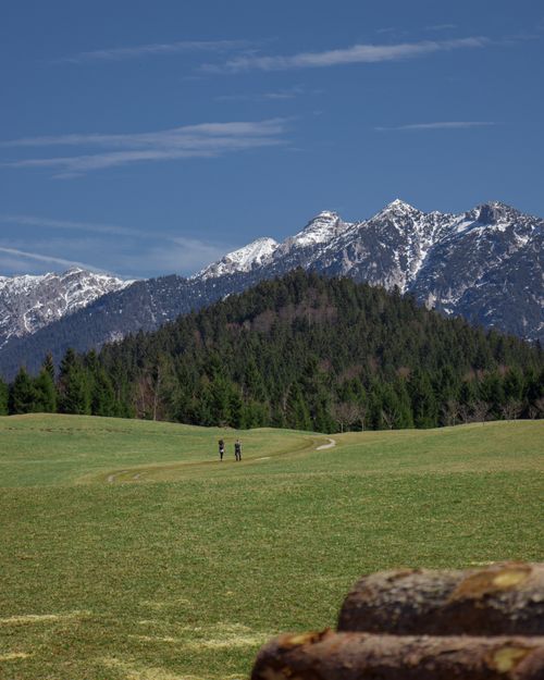 Free Two hikers enjoy the scenic beauty of the Bavarian Alps near Garmisch-Partenkirchen. Stock Photo