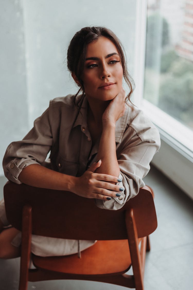 Portrait Of A Woman On A Chair 