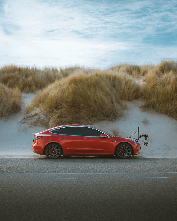 Red Car In The Desert Area