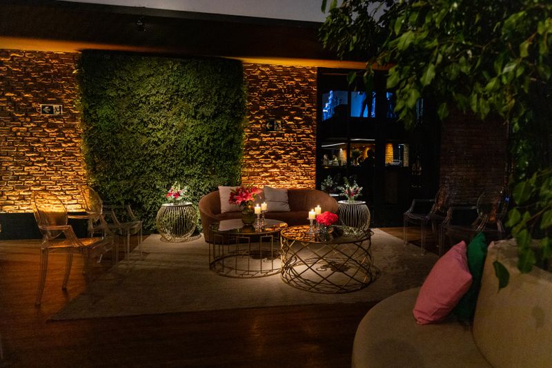 Atmospheric luxury living room designed by Studio Miel in Miami