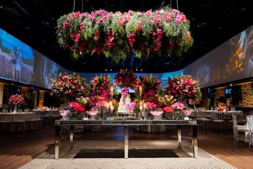 Dessert Table Decorated with Pink Flowers