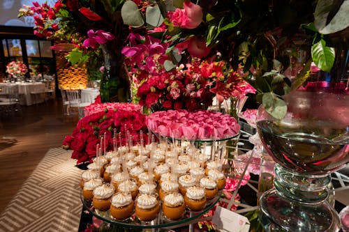 Dessert Table Decorated with Pink Flowers