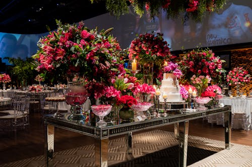 Dessert Table Decorated with Pink Flowers