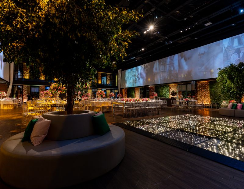 Luxurious indoor wedding reception with ambient lighting