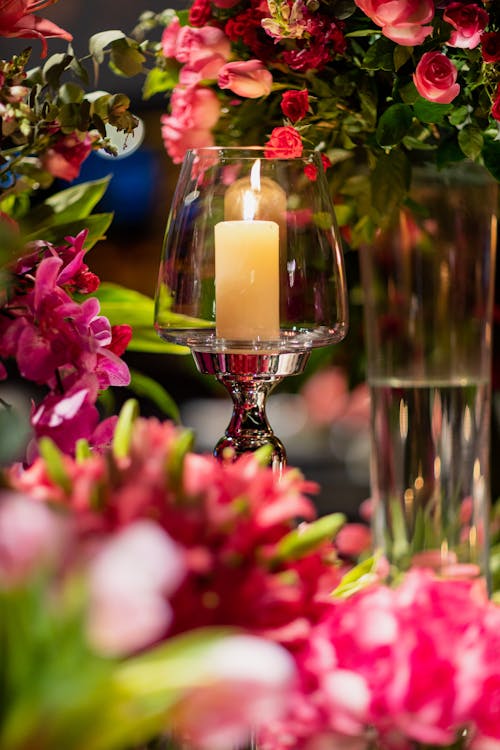 Candle among Flowers