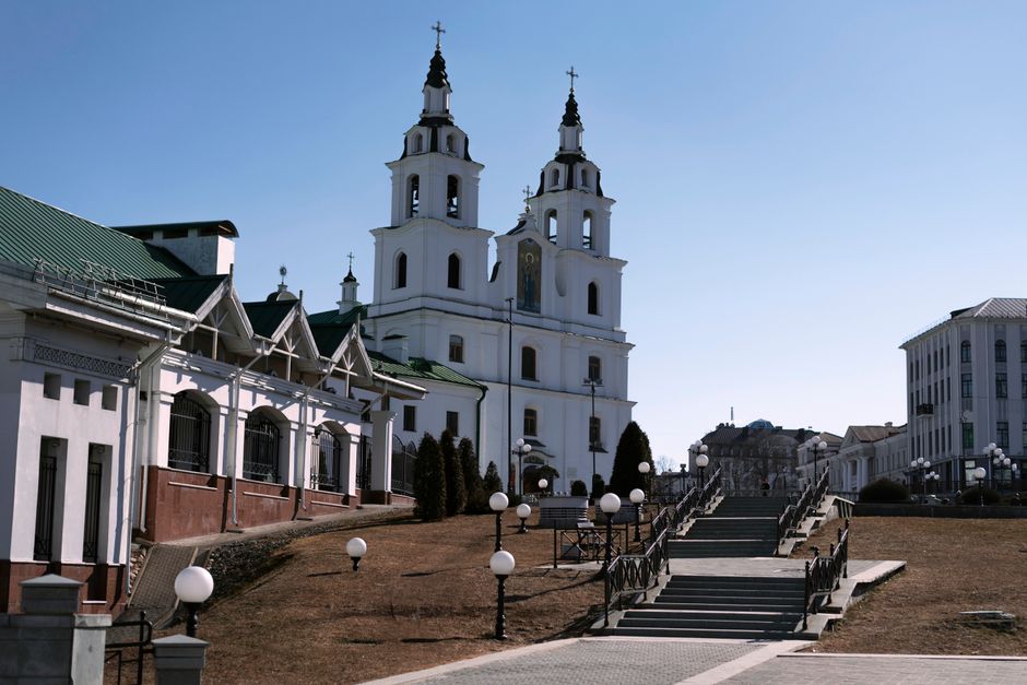 View of the historic Holy Spirit Cathedral surrounded by urban architecture in Minsk.