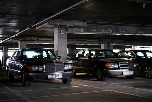 Vintage Mercedes Parked in a Roofed Parking Lot 