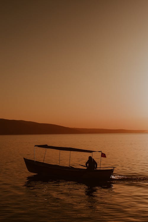 Turkish Boat in the Waters of the Bay at Sunset