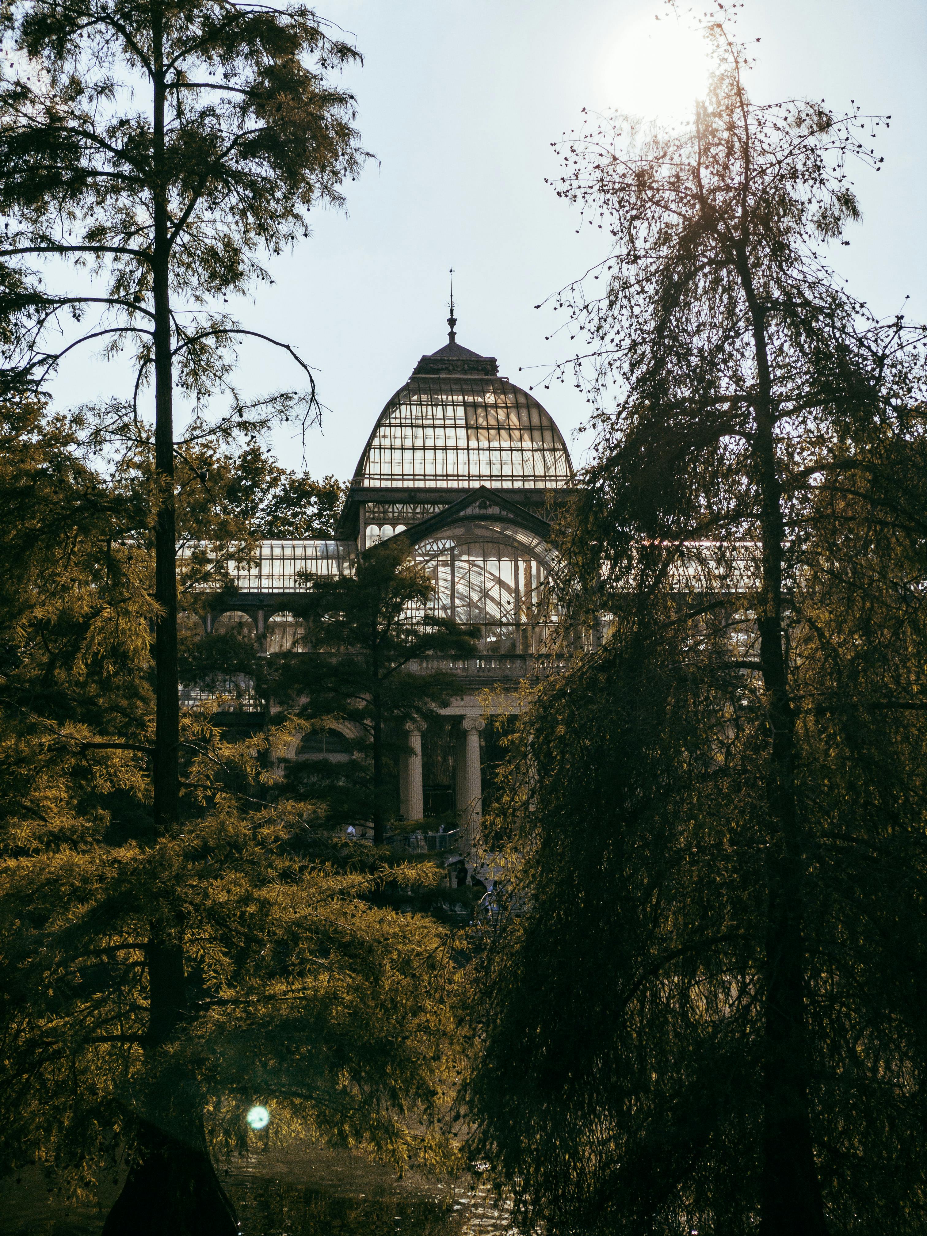 a large building with trees in the background