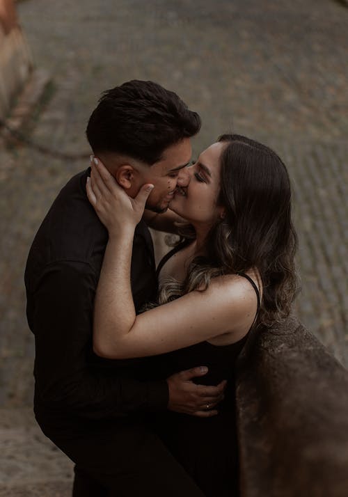 Young Couple Kissing Outdoors