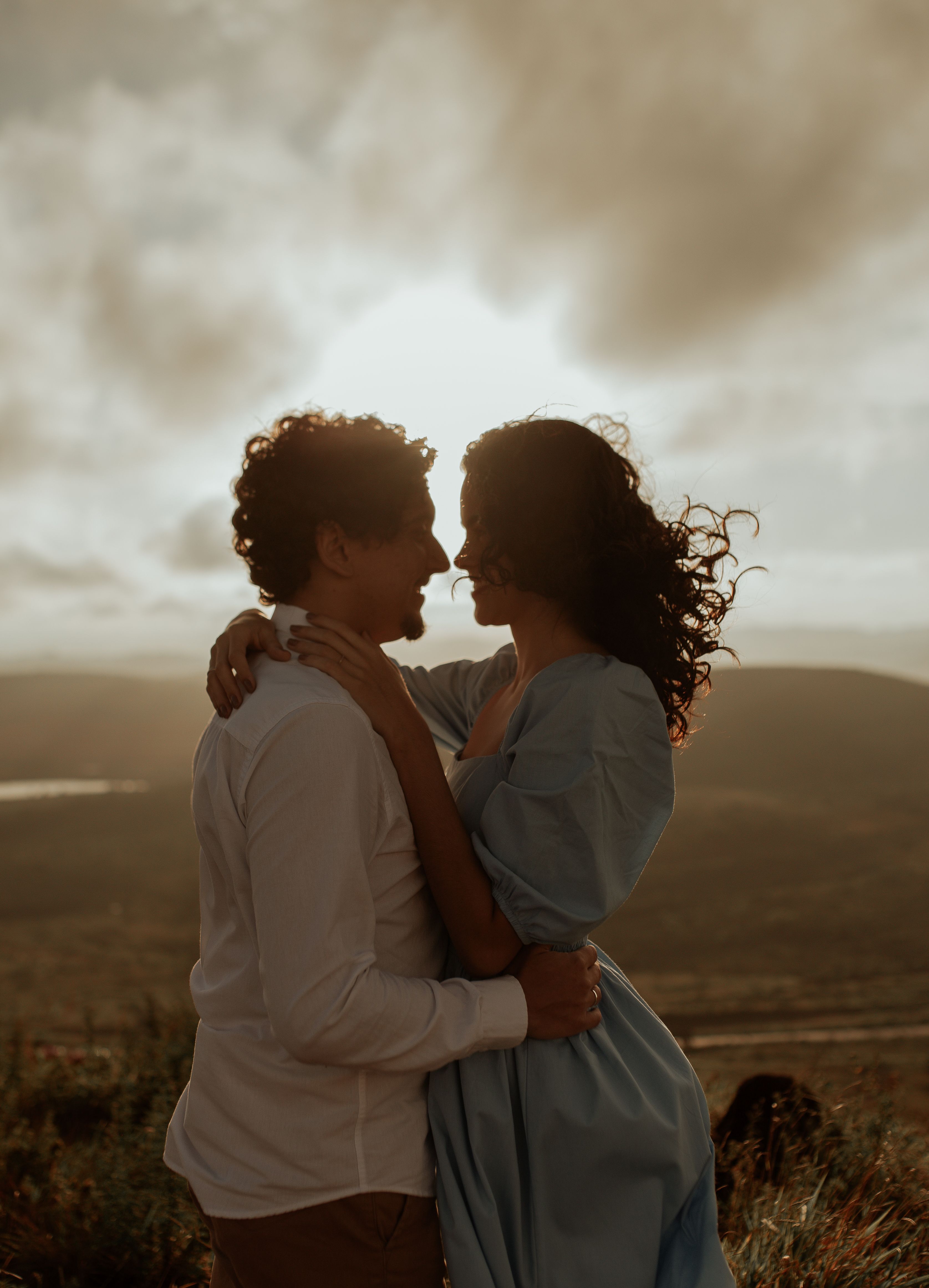 Happy Couple Hugging in Nature on Sunset · Free Stock Photo