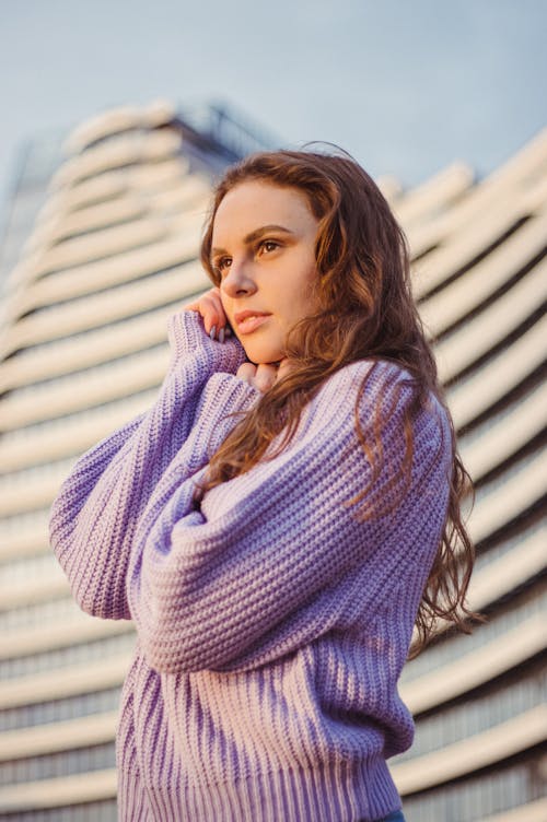 Woman with Brown Hair in a Violet Sweater